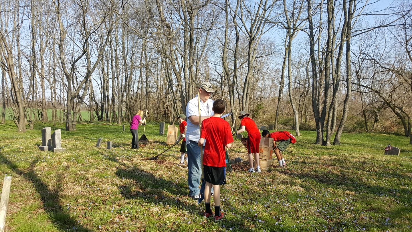 Post members and troop 13 scouts cleaning cemetery at Mt. Zion A.M.E. Church in Woolwich